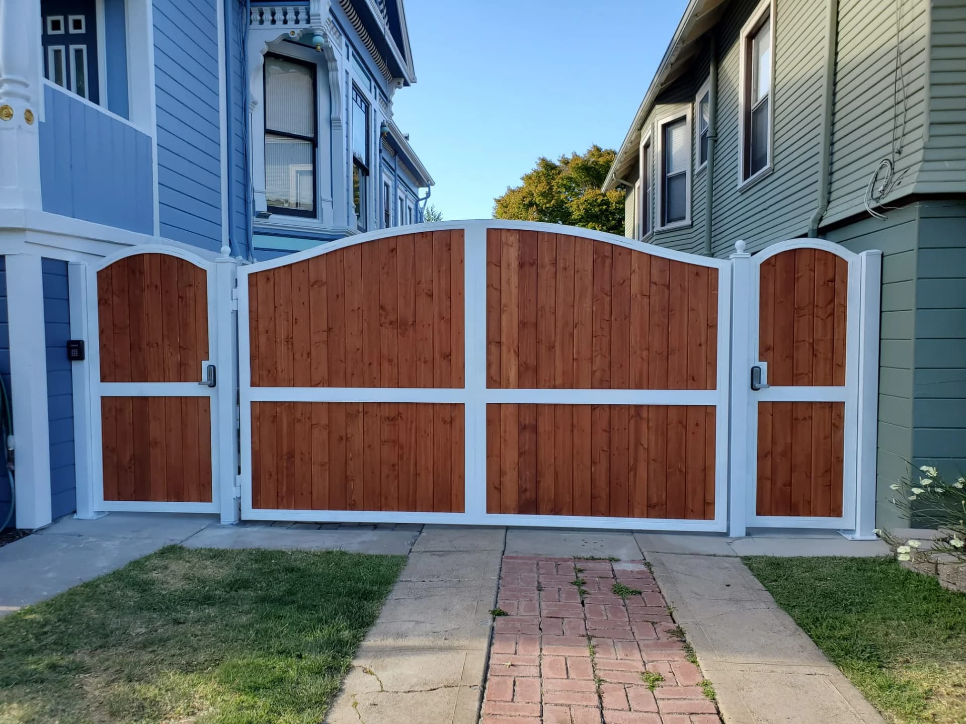 Wooden panel driveway gate installation by SF Bay Automatic Gates